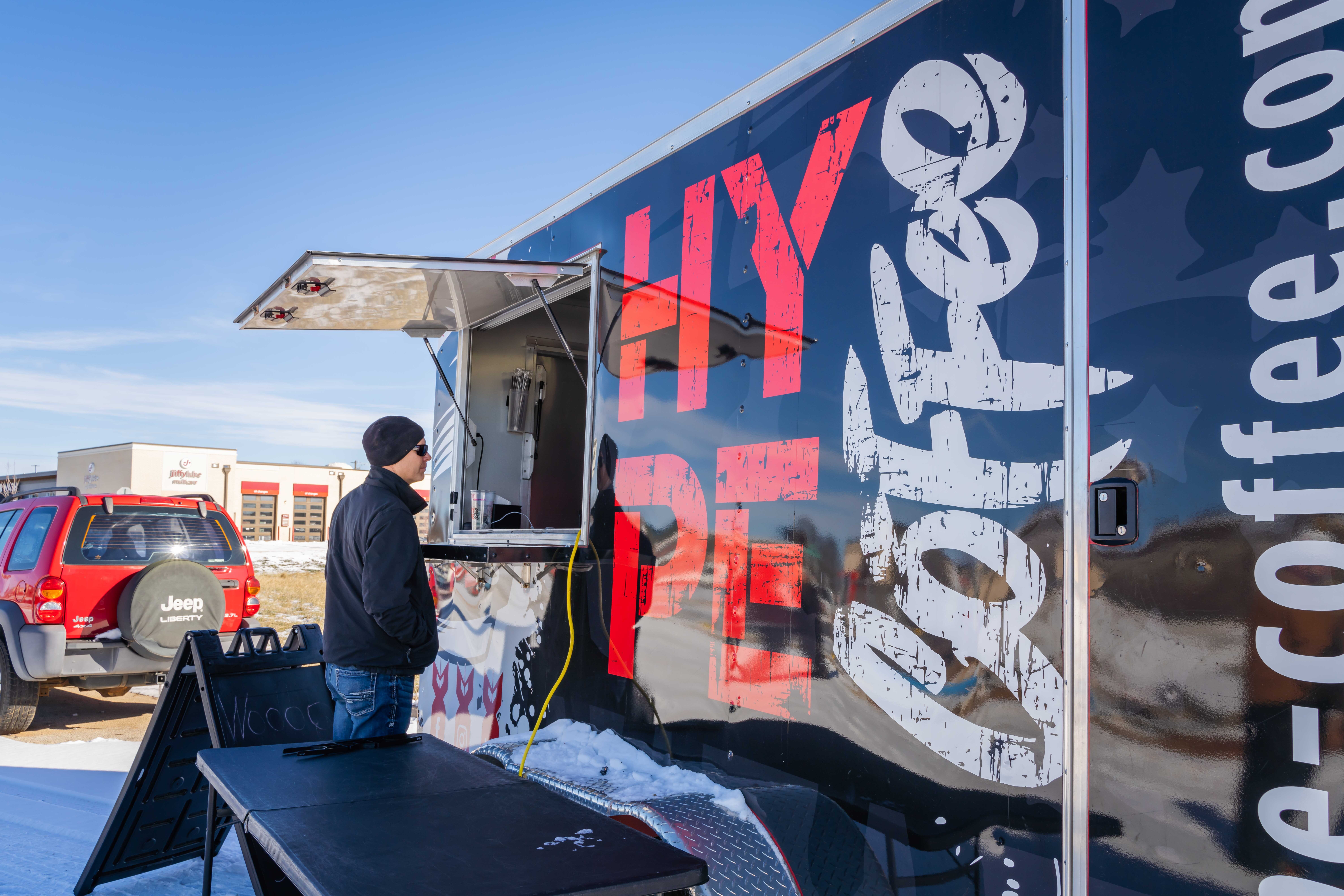 A man ordering at a coffee truck