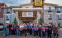 Exterior of a My Place Hotel ribbon cutting