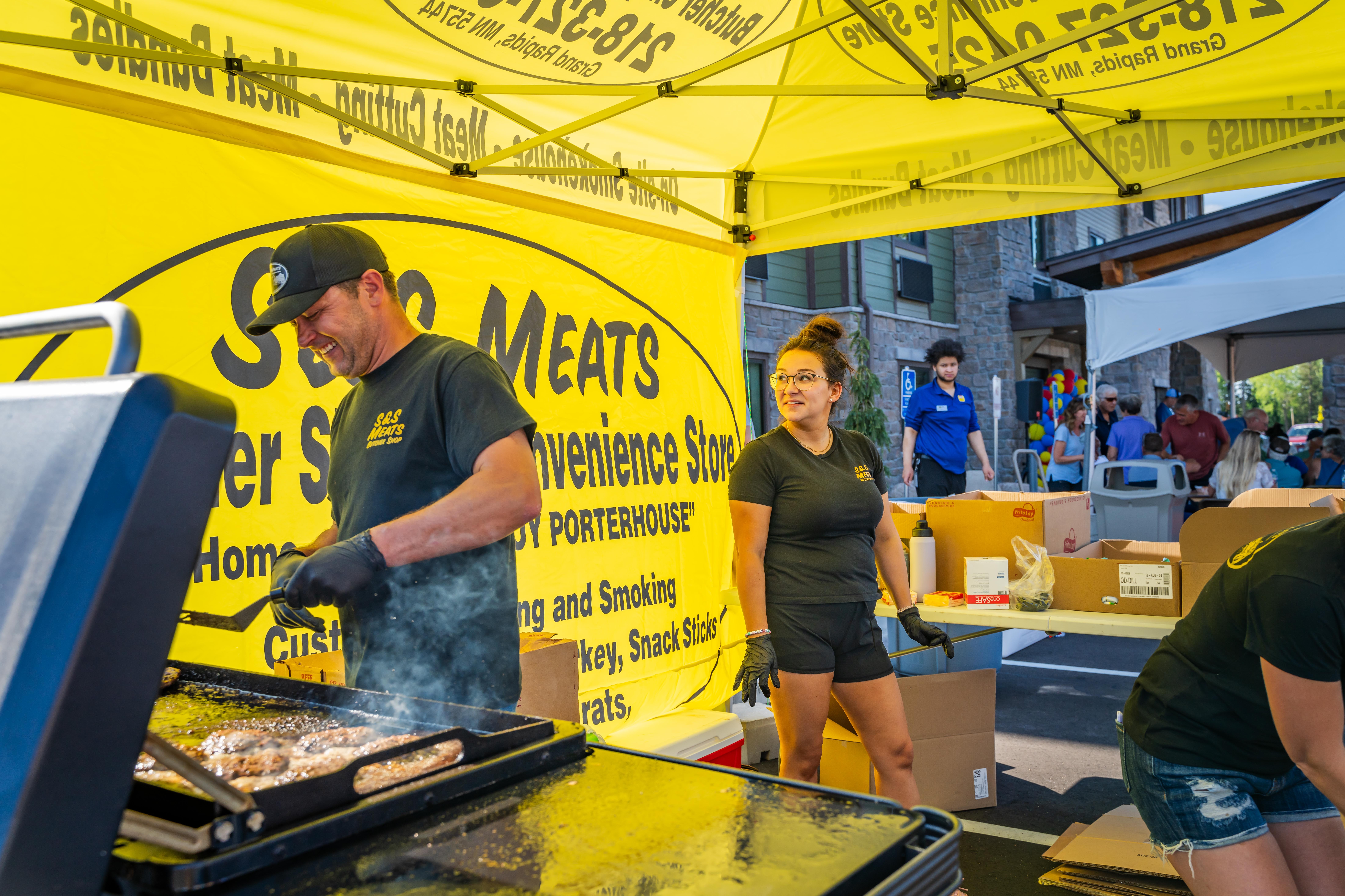 S&S meats serving burgers at a hotel grand opening celebration