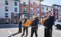 Four musicians are pictured playing their instruments outside of the new My Place hotel.