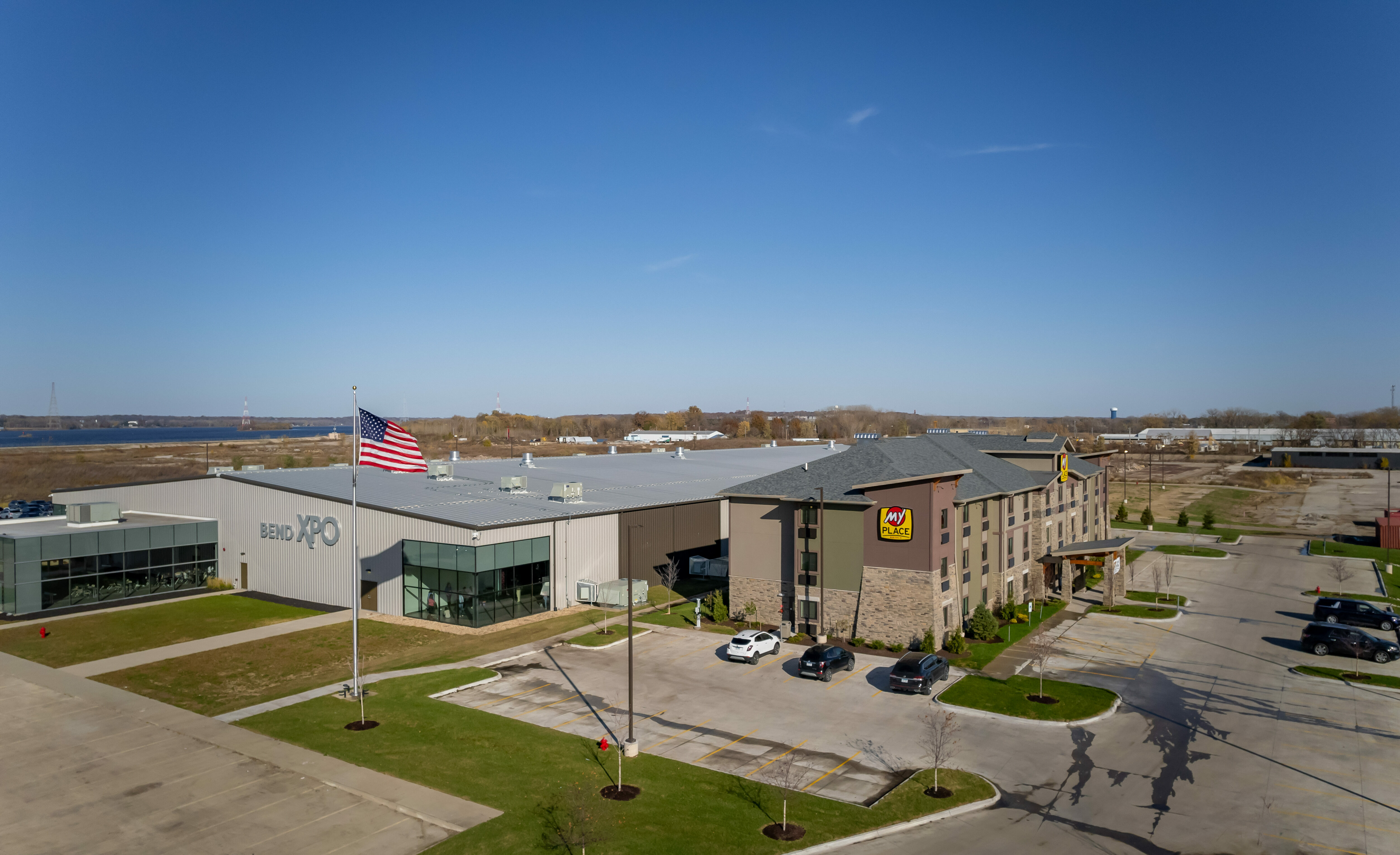 A drone shot of the hotel's exterior showing the Bend XPO center connected to the rear of the hotel.