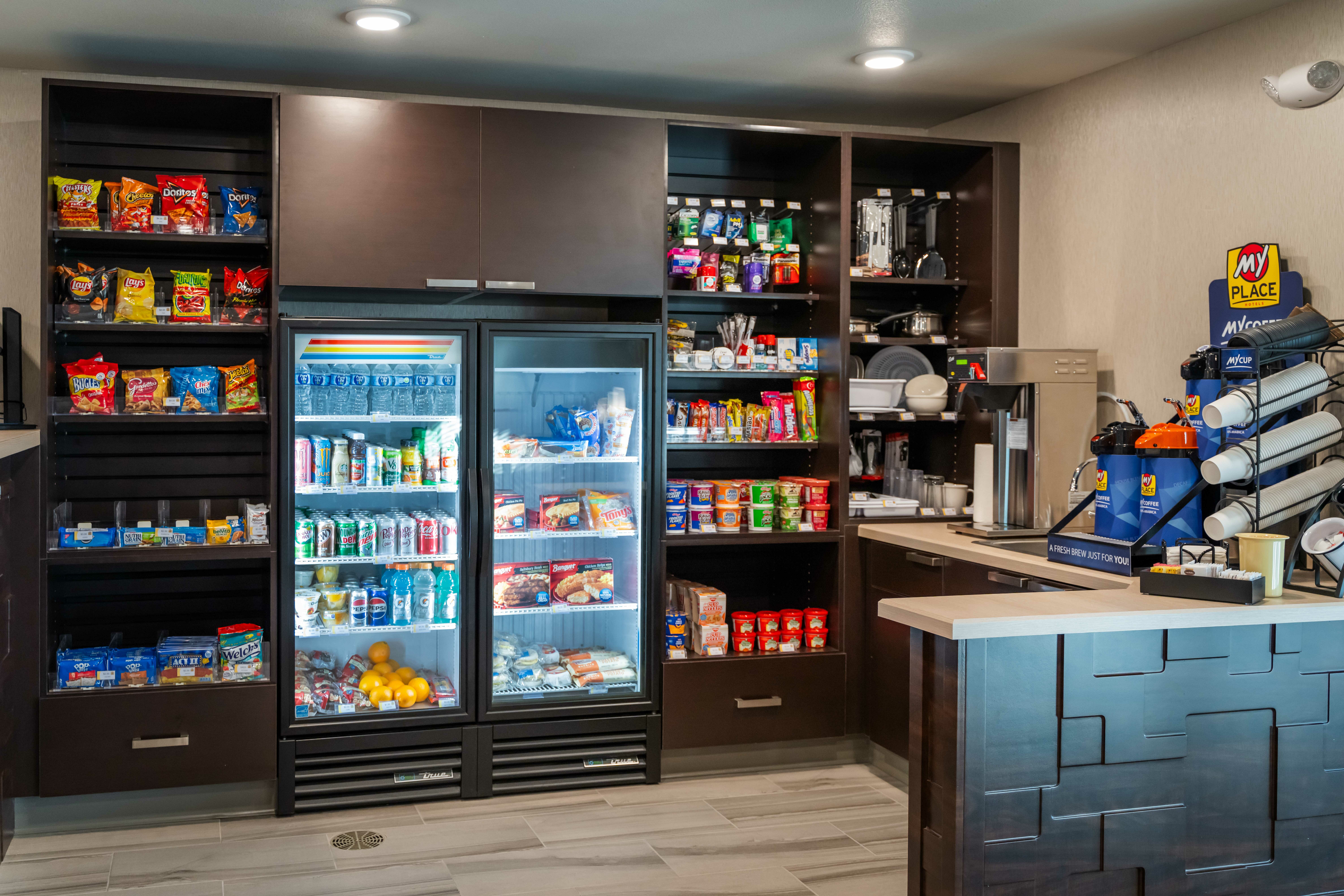 Interior of hotel lobby showing the My Store with snacks, drinks and coffee.