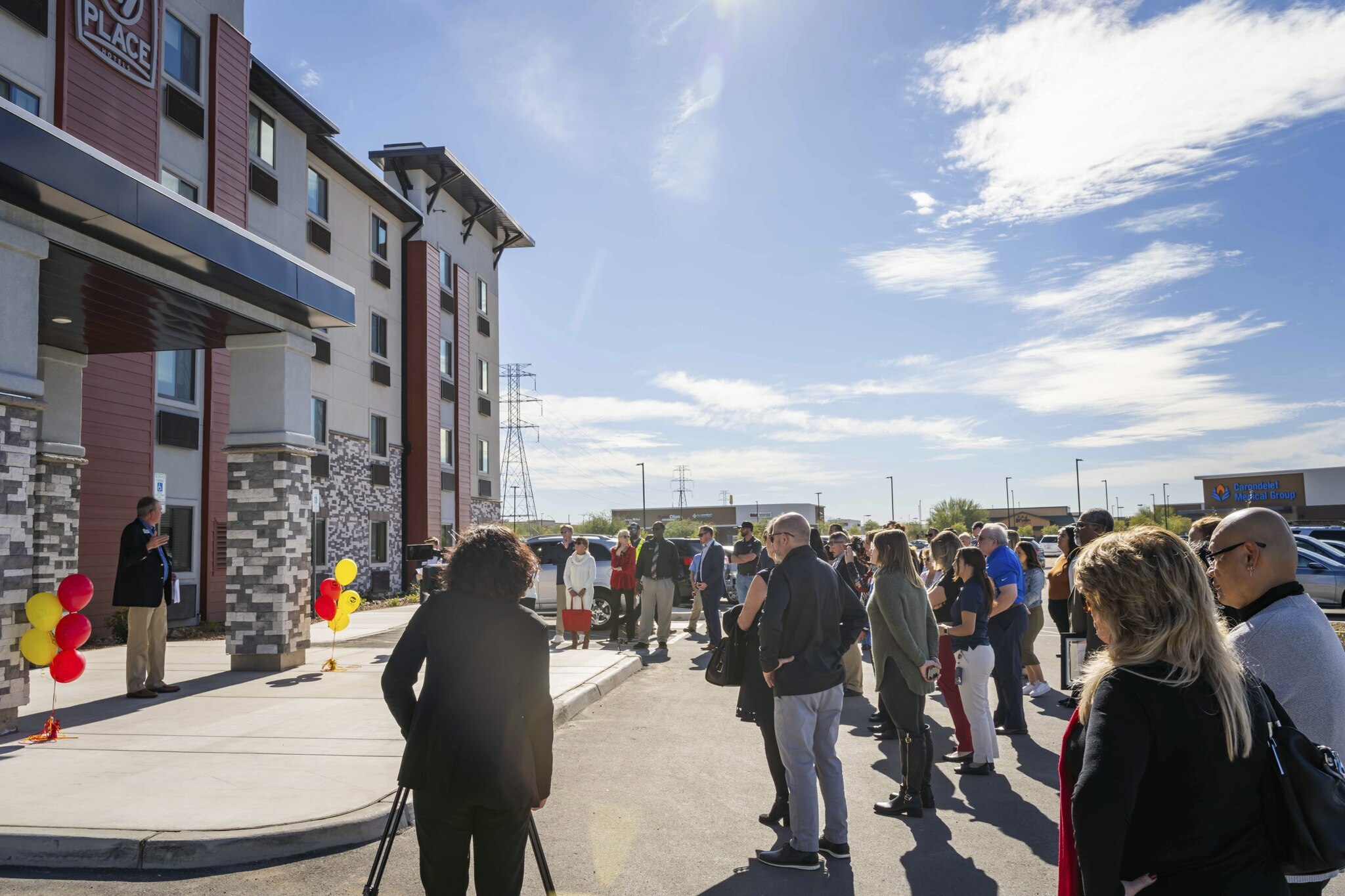 A crowd gathers outside the brand new hotel in Nampa, Idaho as part of the grand opening celebration.