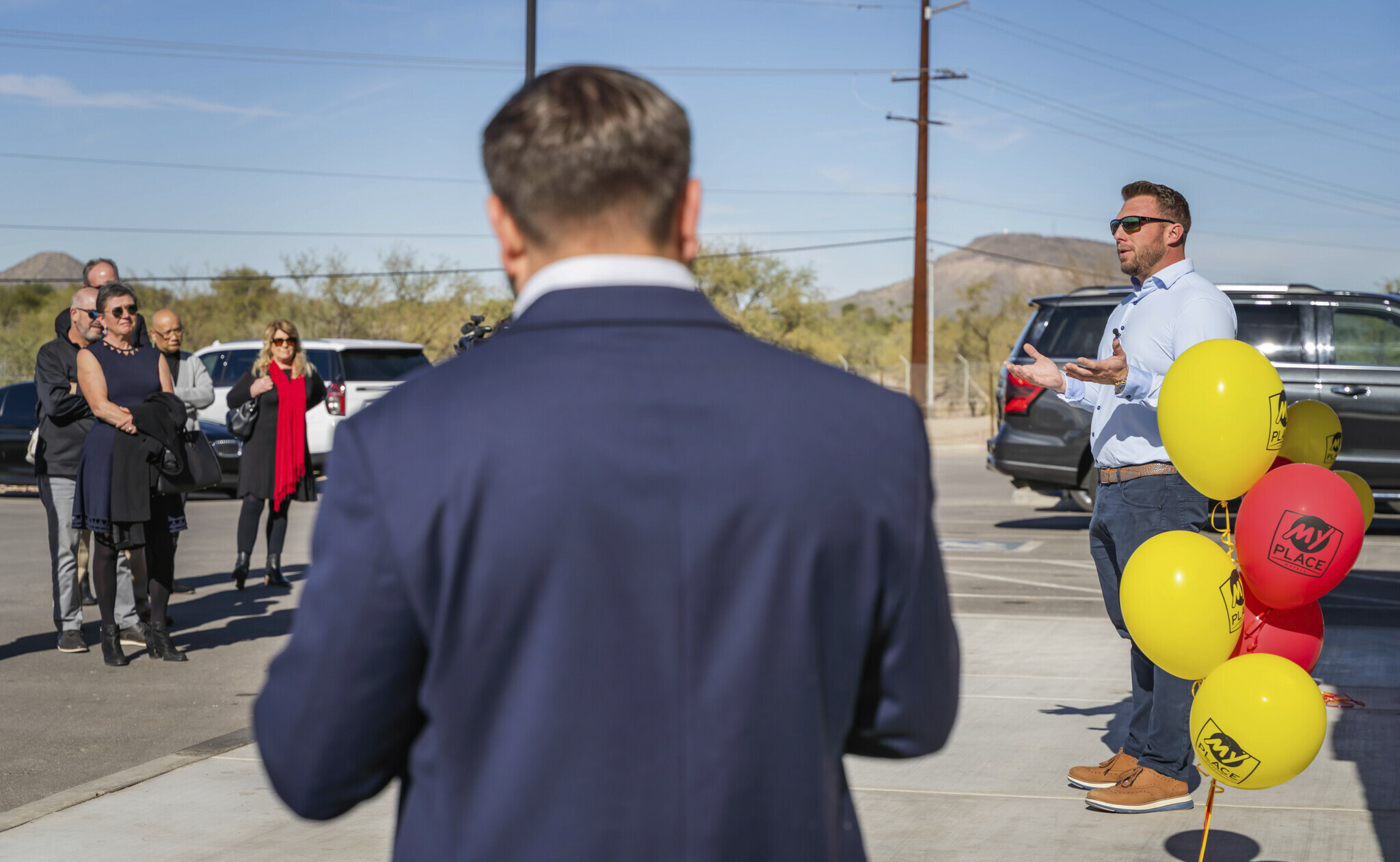 My Place CEO Ryan Rivett addresses a crowd outside the brand new hotel in Nampa, Idaho.
