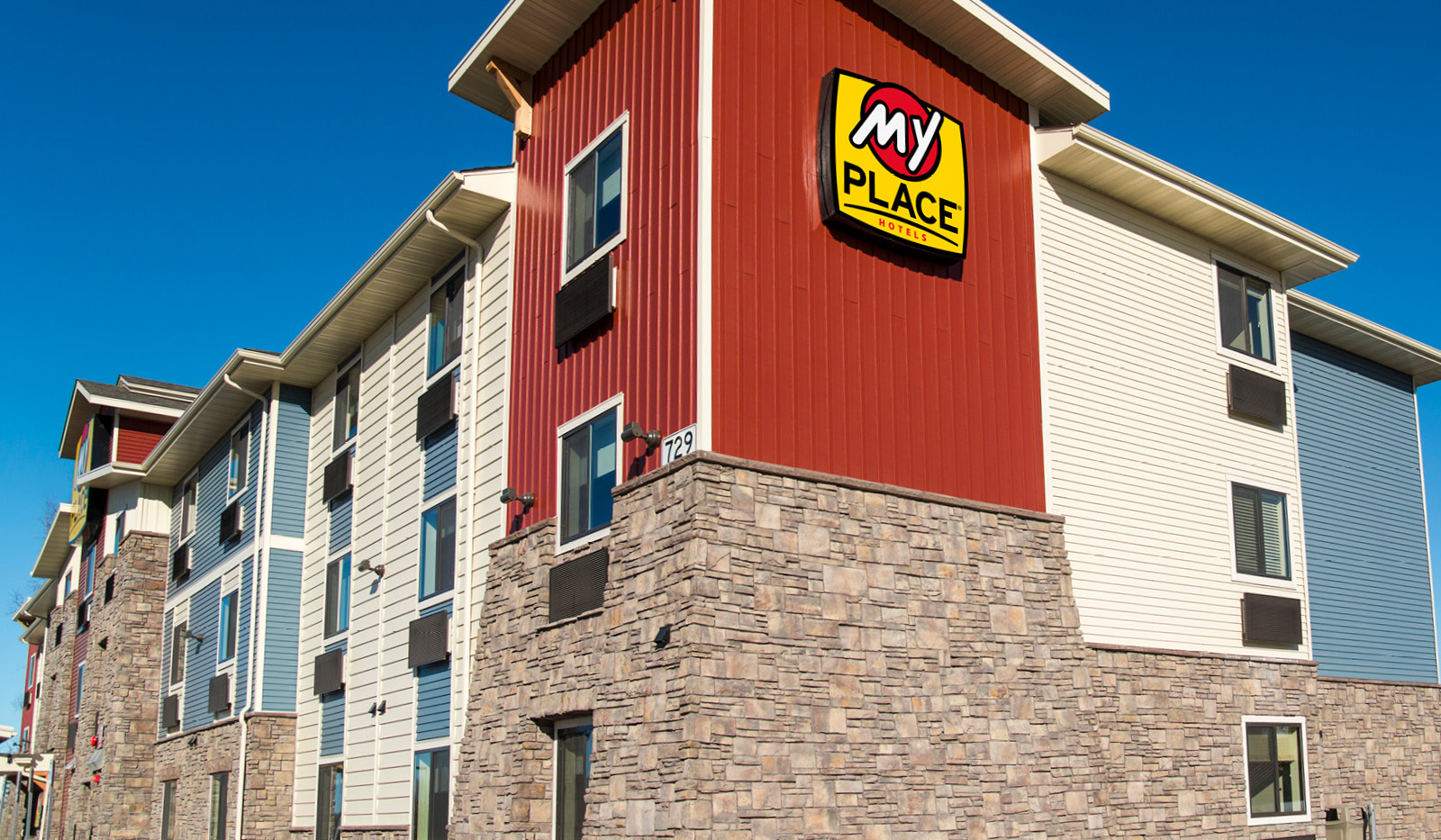 Close up of logo on the side of the My Place Hotel.