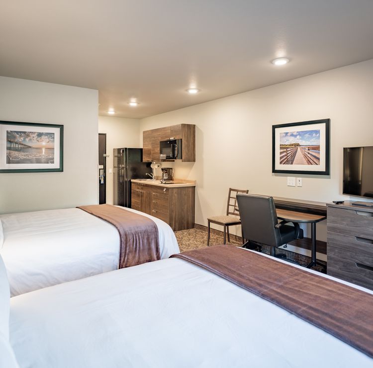 Port Charlotte room interior with two beds