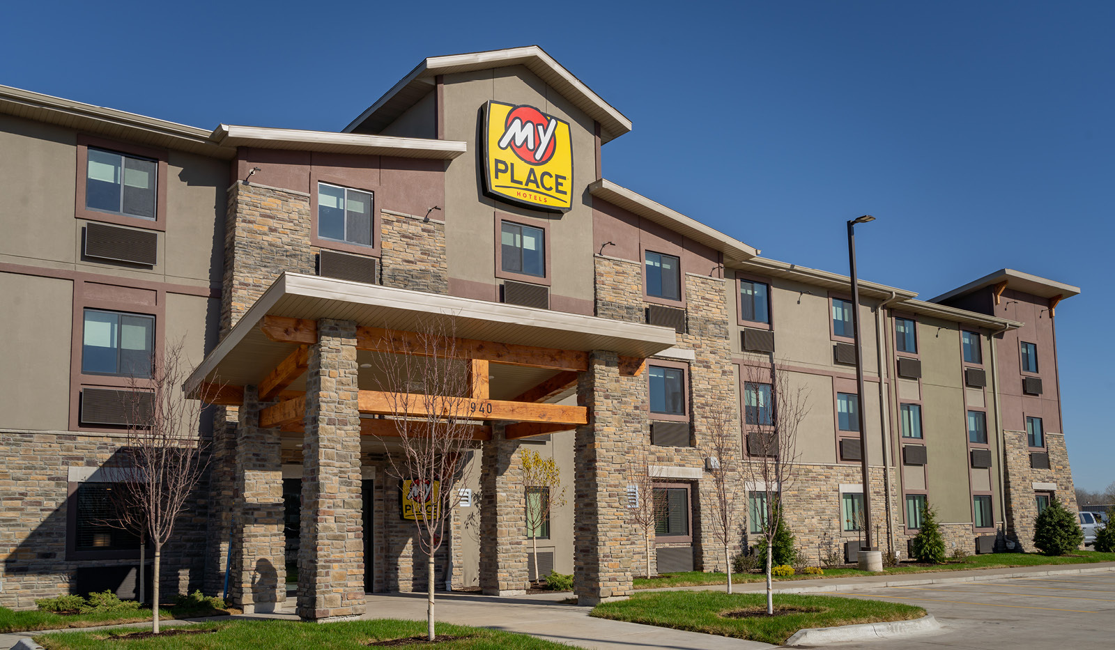 Exterior of My Place Hotel-East Moline, IL's front entrance.
