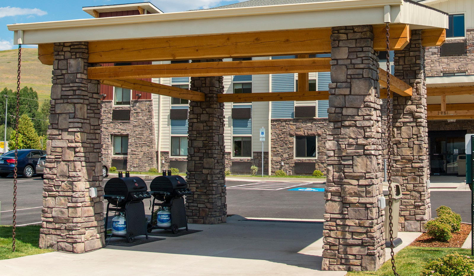 Exterior of My Place Hotel-Missoula, MT's grilling pavilion across from hotel's main door.