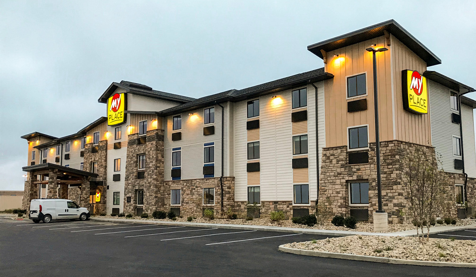 Exterior of My Place Hotel-Marion, OH under a cloudy sky.