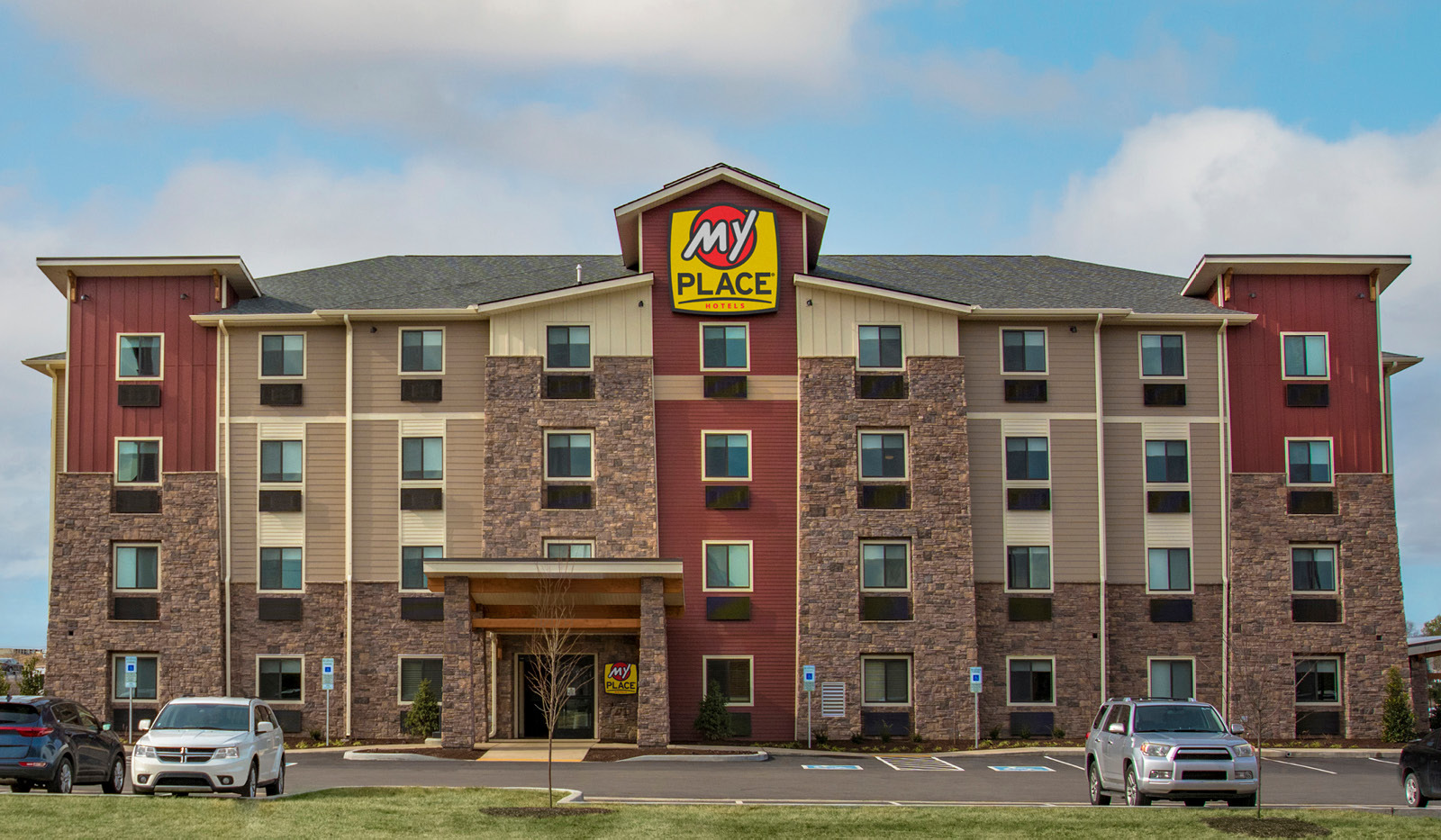 Exterior of My Place Hotel-Lebanon, TN under a cloudy sky.