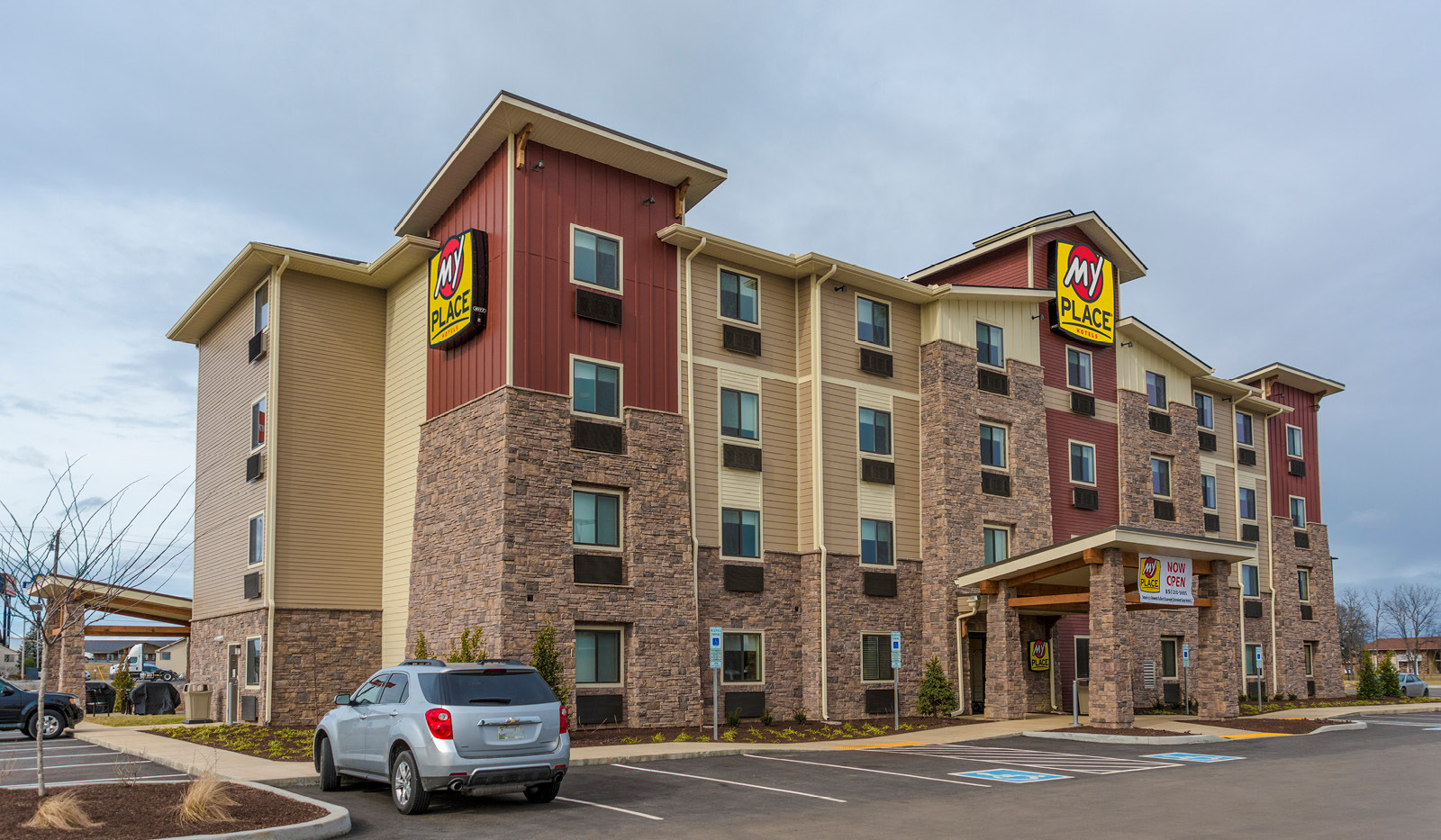 Exterior of My Place Hotel-Lebanon, TN under a cloudy sky.