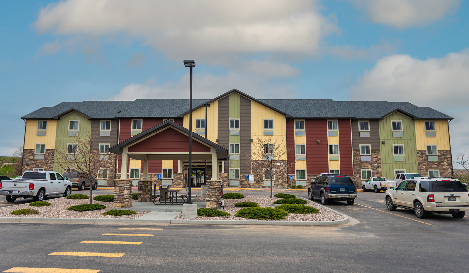 Exterior My Place Hotel-Cheyenne, WY and parking lot.