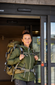Hiker leaving a My Place Hotel.