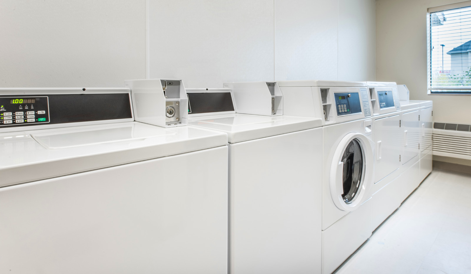On-site laundry facility with coin operated washers and dryers.