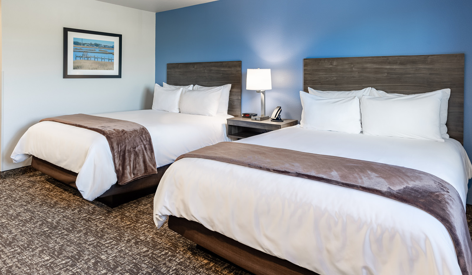 My Place Hotel room featuring two pillowtop beds.