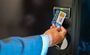 Key card being placed on the door knob.