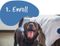 Dog with a graphic that says "Enroll"