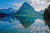 Mountain reflecting over a large lake