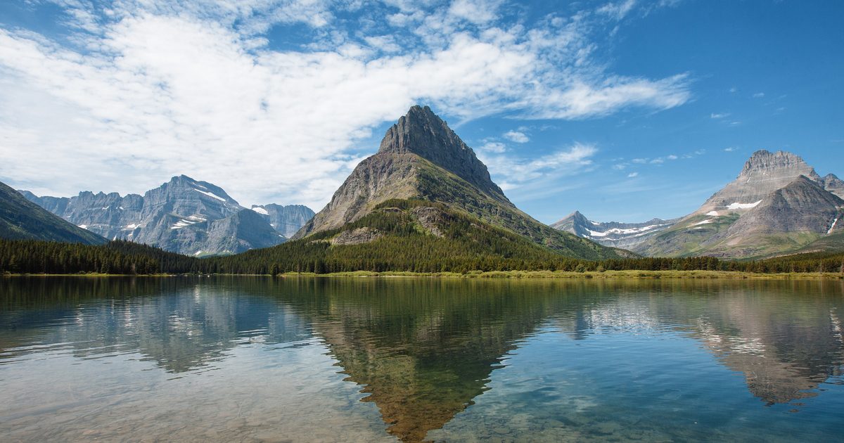 Mountain views reflecting over a lake.
