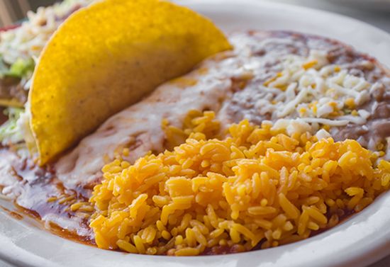 Mexican dish with tacos and rice.