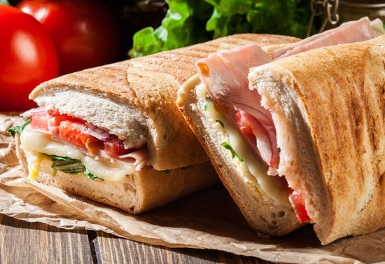 Panini sandwiches with meat and tomatoes.