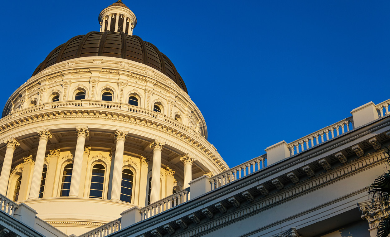 Top dome of a large building with intricate details.
