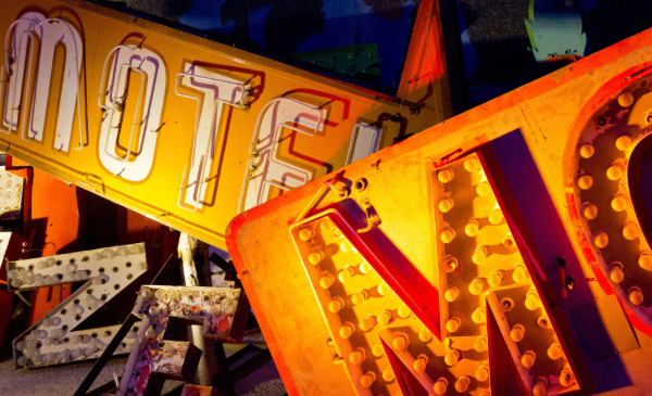 A small collection of old, discarded marquee signs.