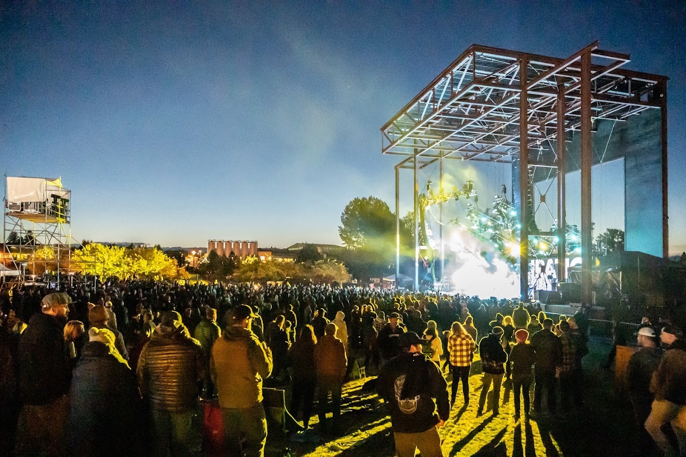 Landscape view of a packed full in attendance amphitheater.