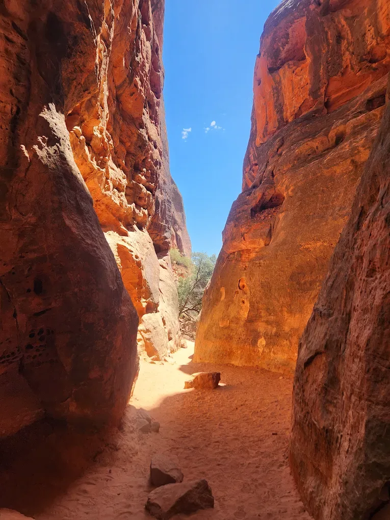 A view of red cliffs, meeting to make a very narrow naturual